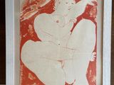 une photo d'un tableau représentant une femme nue, dans un cadre blanc