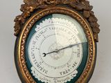 a clock that is sitting on a white table
