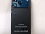 a close up of a phone with a camera attached to it