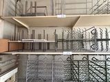 a room with shelves and shelves that have wine bottles on them