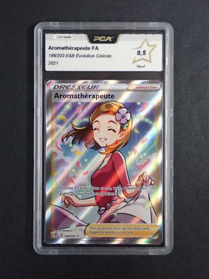 a close up of a card with a girl in a red shirt