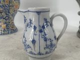 three vases that are sitting on a table