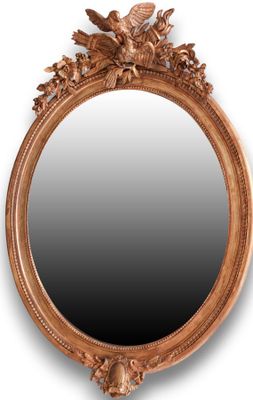 an oval mirror with a bird and flower decoration on it