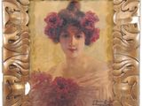 tableau représentant une femme avec des fleurs dans les cheveux, dans un cadre doré