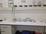 an image of a work station with a lot of wires on it