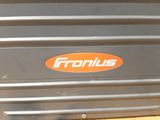 an image of a fronius case sitting on a wooden floor