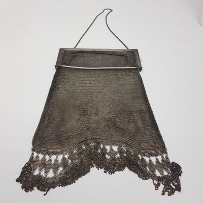an image of a purse hanging on a wall