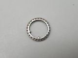 a close up of a metal ring on a table