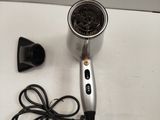 a hair dryer that is sitting on a table