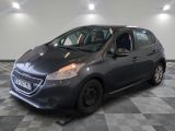 a picture of a grey car parked in a garage