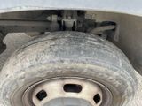 a close up view of a tire on a truck