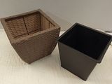 two baskets sitting next to each other on a table
