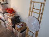 an image of a room with a fan and a chair