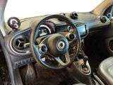 a steering wheel and dashboard of a small car