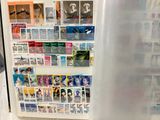 a refrigerator with a bunch of stamps on it
