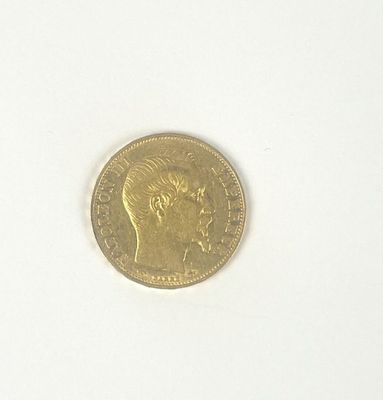 a gold coin with a picture of a man on it