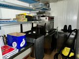 a room that has a lot of clutter and a lot of stuff on it