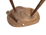 a wooden stand with two baseball bats on top of it