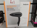 packaging of a blow dryer sitting on top of a counter