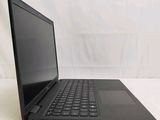 an open laptop computer sitting on top of a white surface