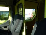 a view of the inside of a van with the door open