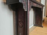 a wooden table with a door on the top of it