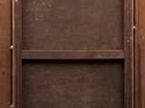 an old wooden cabinet with a brown door and a window