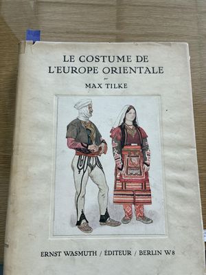 a book with a picture of two people standing next to each other