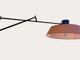a wall mounted lamp that is on the wall