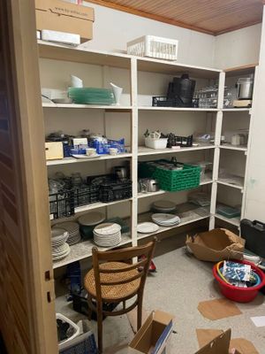 a room with a lot of boxes and boxes on the floor