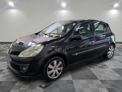 a picture of a black car parked in a garage