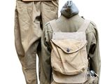 military uniform on a mannequin with a backpack on a white background