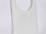 a white purse with a handle on a white background