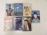 a lot of dvds that are on the table