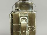 a small metal object that is on top of a table