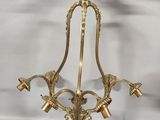 a close up of a chandelier on a white background