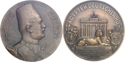 an image of a coin with a picture of a man and a dog on it