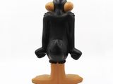 mickey mouse figurine sitting on top of a wooden base