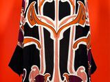 an image of a black and orange jacket on a mannequin