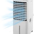 a white and black air cooler sitting on top of a white table