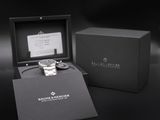 the watch is in a black box with a card in it