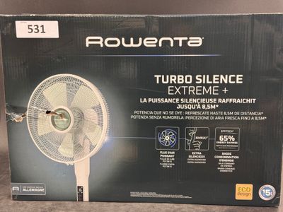 un gros plan d'une boîte contenant un ventilateur