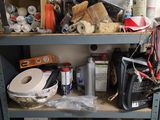 a shelf with various items on it in a room