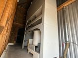 an image of a large storage room with a water heater in it