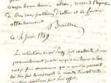 a close up of a handwritten letter on a piece of paper