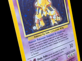 a yellow card with a picture of a pokemon character on it