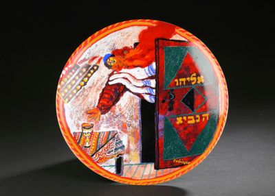 a plate that has a picture of a man on it