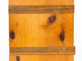 a close up of a wooden box on a white background