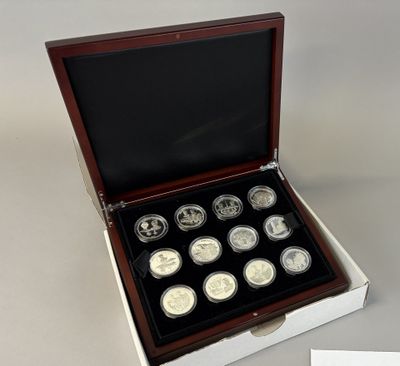 an image of a box with six silver coins in it