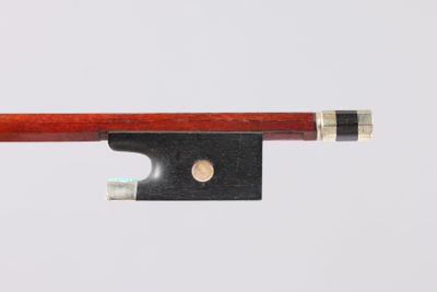 a close up of a violin bow on a white background